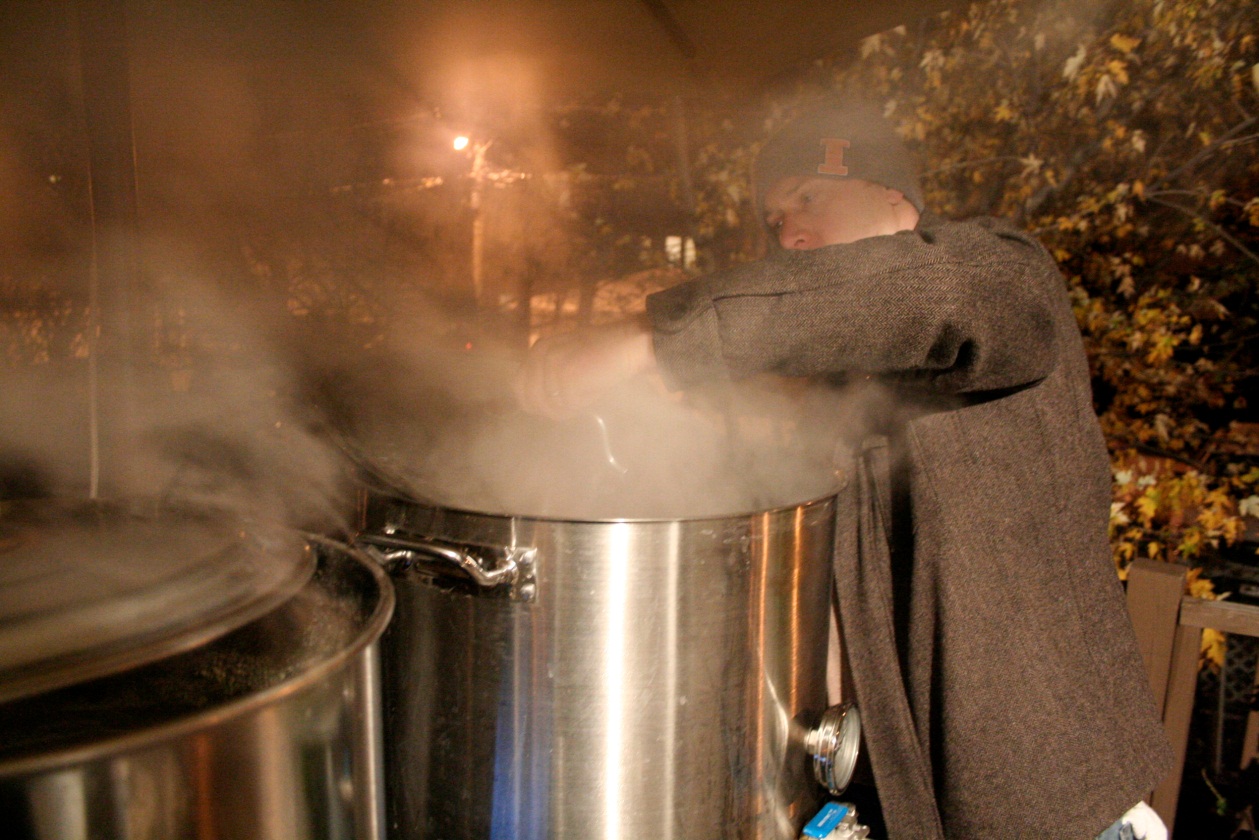 Mike is adding a few ingredients to the boil.